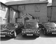 Daimler hearse and limousines